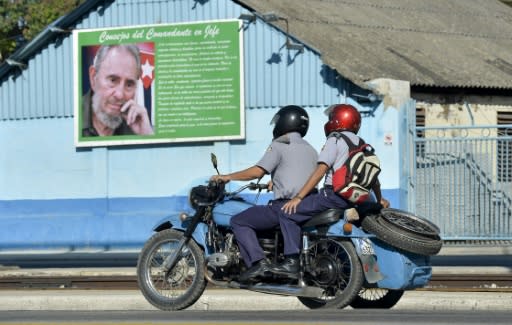 Even Cuban police officers travel on motorcycles with sidecars in the streets of Havana