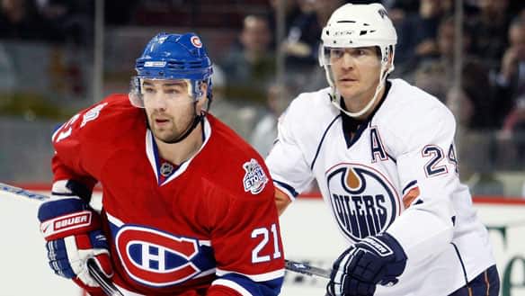 Montreal's Chris Higgins, left, and Edmonton's Steve Staios are in the thick of playoff races as the NHL's regular season hits the stretch drive. 