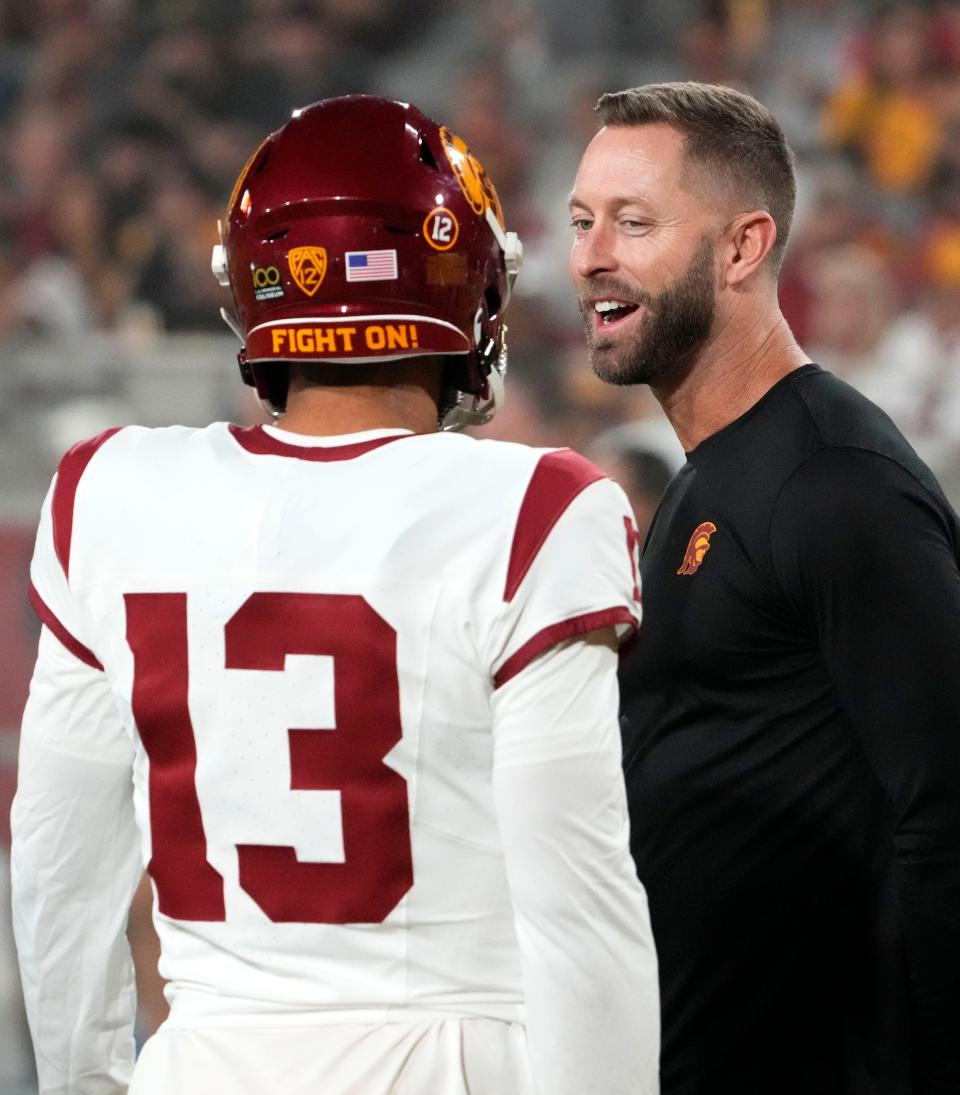 Former Texas Tech quarterback and head coach Kliff Kingsbury, right, is scheduled for induction into the Tech Athletics Hall of Fame on Friday in ceremonies at the Overton Hotel & Conference Center. Kingsbury currently is on the staff at Southern California as senior offensive analyst.