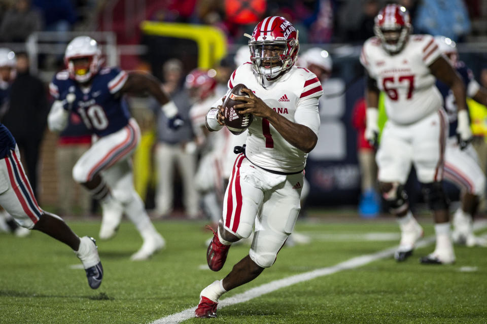 Louisiana-Lafayette quarterback Levi Lewis (1) runs the ball against Liberty during an NCAA college football game, Saturday, Nov. 20, 2021, at Williams Stadium in Lynchburg, Va. (AP Photo/Kendall Warner)