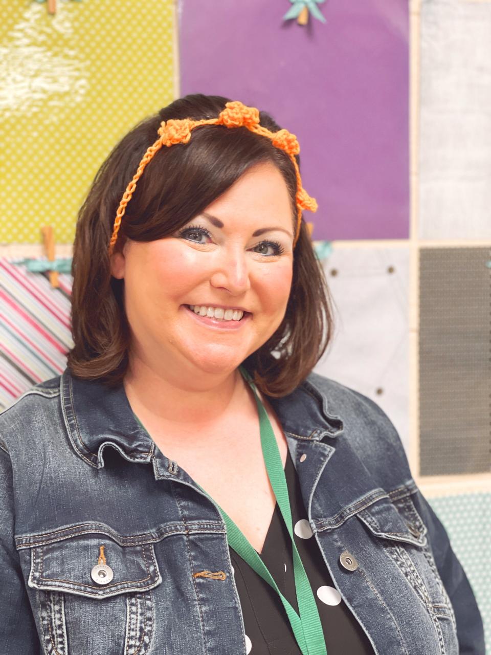 Dogwood Elementary School teacher Kim McDaniel wears a crocheted headband made for her by Mya Silva.  Nov. 18, 2021.