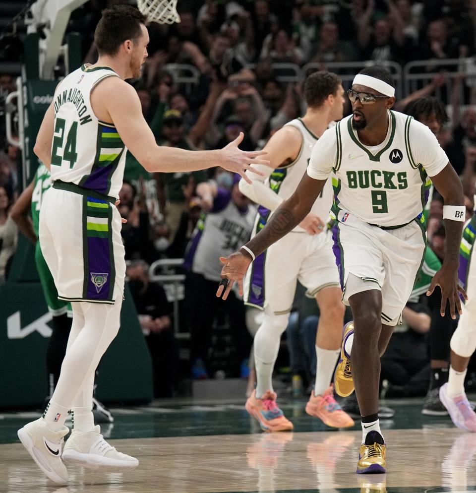 Both Pat Connaughton, left, and Bobby Portis will be back with the Milwaukee Bucks this season.