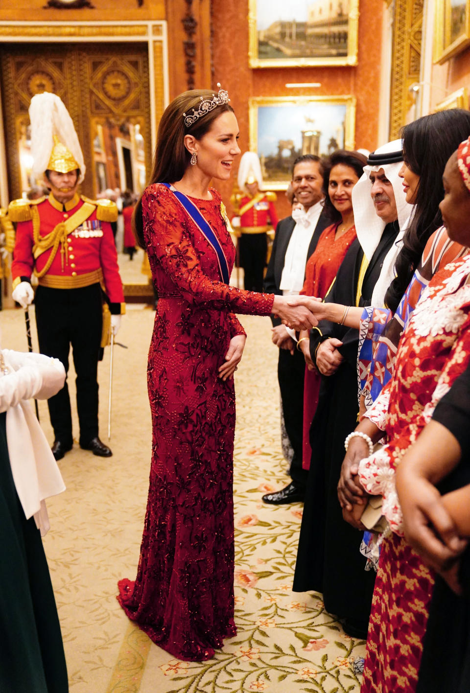 Britain's Catherine, Princess of Wales, greets guests during a Diplomatic Corps reception at Buckingham Palace in London on December 6, 2022. (Photo by Victoria Jones / POOL / AFP) (Photo by VICTORIA JONES/POOL/AFP via Getty Images)