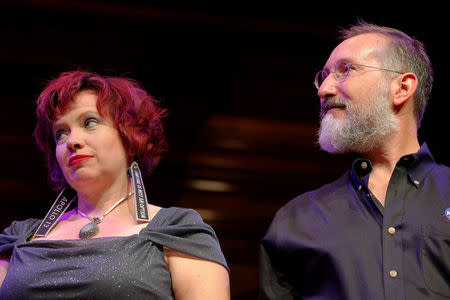 NASA scientists Lisa Danielson (L) and Will Stepanov are celebrated onstage for their wedding anniversary during the 26th First Annual Ig Nobel Prize ceremony at Harvard University in Cambridge, Massachusetts, U.S. September 22, 2016, fifteen years after they were married during an Ig Nobel prize ceremony. REUTERS/Brian Snyder