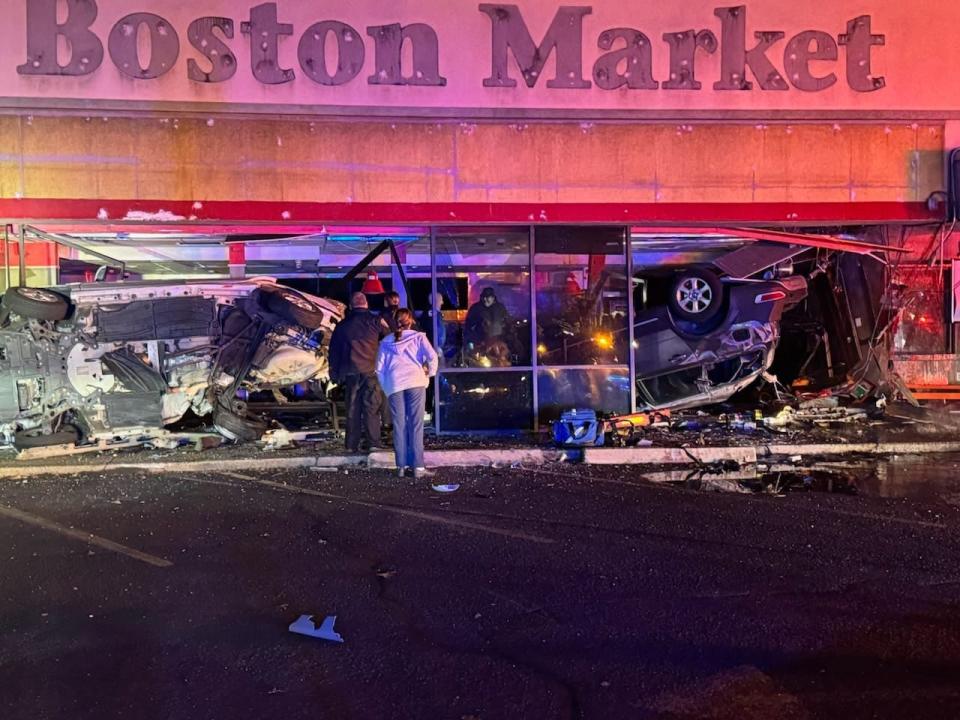 Two cars flipped and crashed into the storefront of former Boston Market in a dramatic accident after a moving vehicle collided with a parked car in Saugus, Massachusetts.
