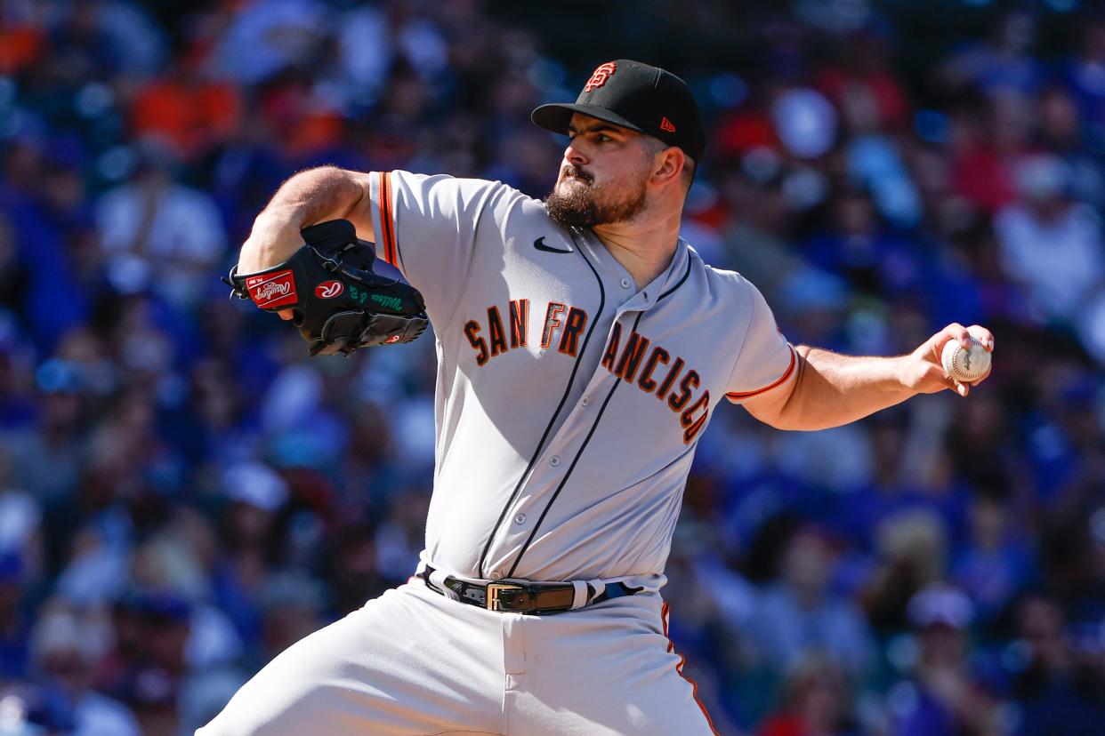 Giants starting pitcher Carlos Rodon delivers a pitch against the Chicago Cubs during the first inning at Wrigley Field in Chicago on Sept. 9, 2022.