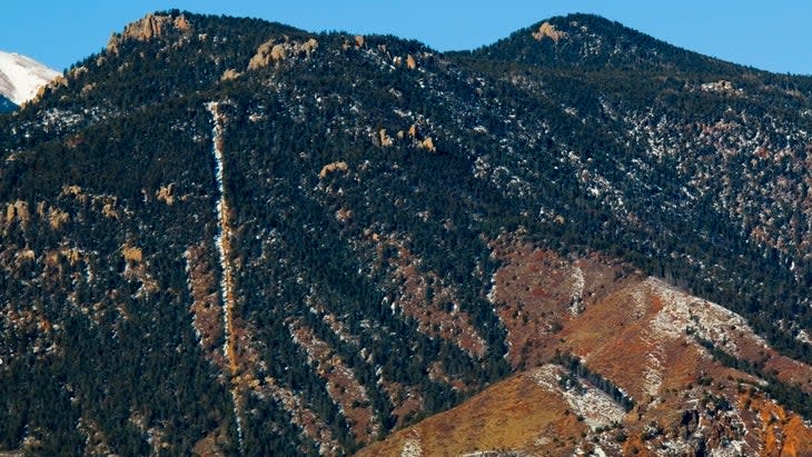 A mountain photo of a steep trail