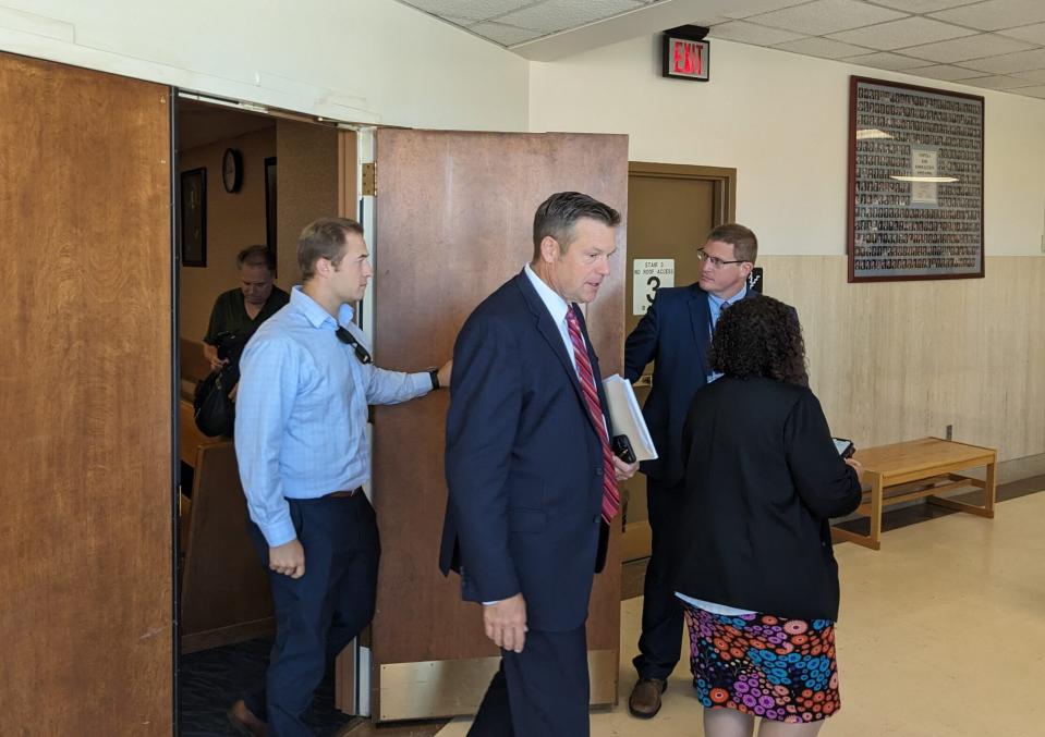 Kansas Attorney General Kris Kobach, show emerging from a Shawnee County District Court room in Topeka, filed a lawsuit alleging TikTok knowingly violated the state's consumer protection law by trafficking pornography and other disturbing content through its app. (Tim Carpenter/Kansas Reflector)