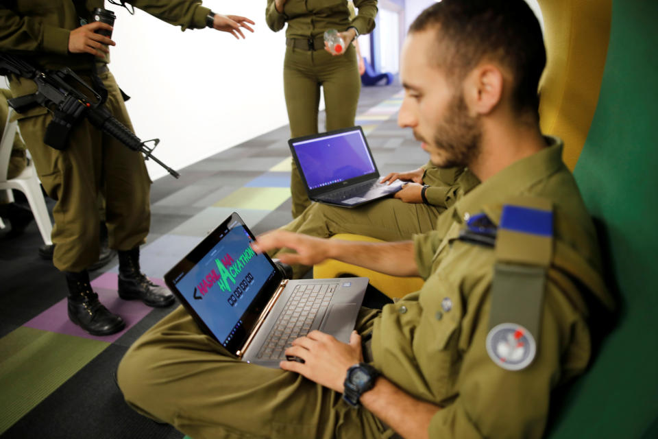 Israeli soldiers work on laptops as they take part in a cyber security training course, called a Hackathon, at iNT Institute of Technology and Innovation, at a high-tech park in Beersheba, southern Israel August 28, 2017. Picture taken August 28, 2017.