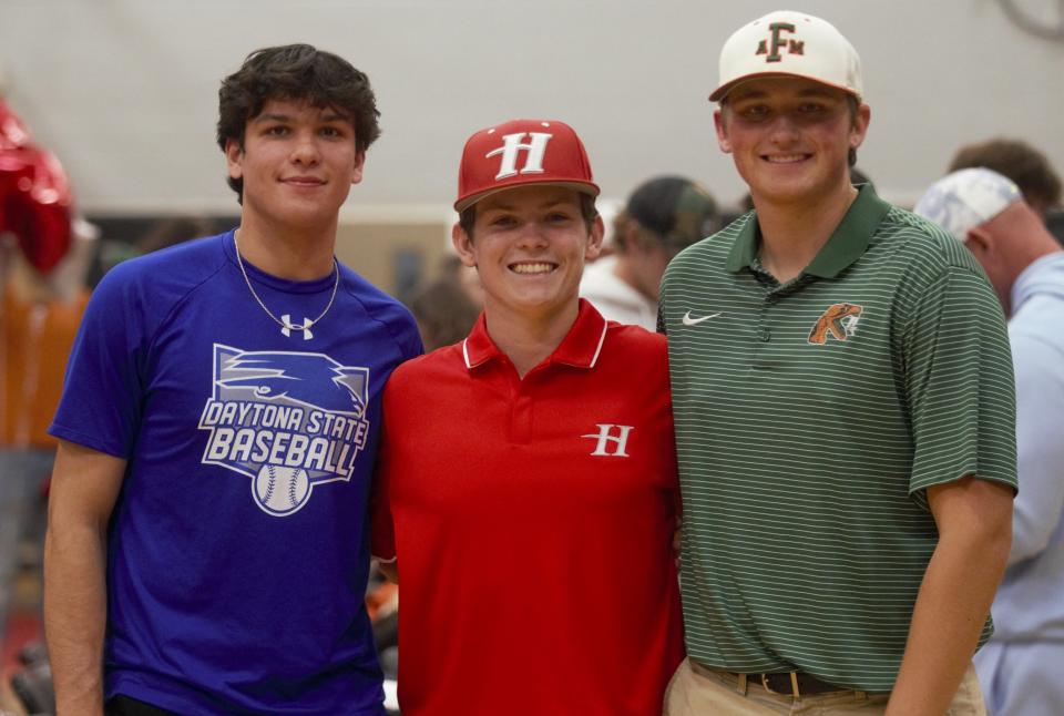 NFC baseball players Walker Sparkman, Noah Miller and Garrett Workman sign to play college baseball on Wednesday, Nov. 15 at NFC's gym