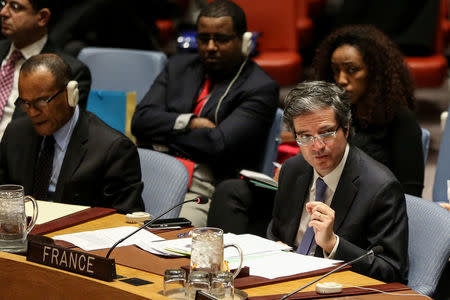 Permanent Representative of France to the United Nations Francois Delattre (R) attends the United Nations Security Council session on imposing new sanctions on North Korea, in New York, U.S., December 22, 2017. REUTERS/Amr Alfiky