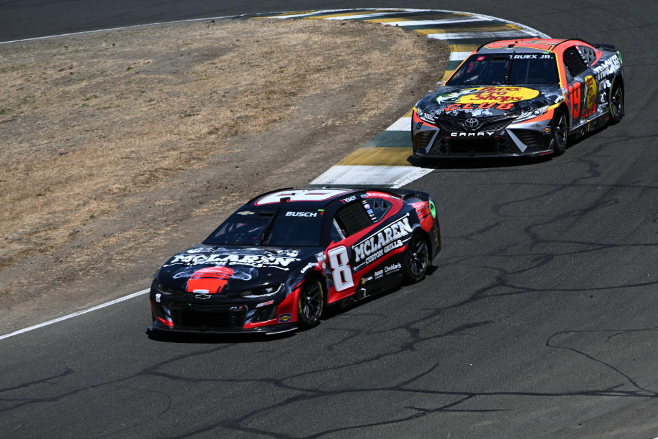 SONOMA, CALIFORNIA - JUNE 11: Kyle Busch, driver of the #8 McLaren Custom Grills Chevrolet, and Martin Truex Jr., driver of the #19 Bass Pro Shops Toyota, race during the NASCAR Cup Series Toyota / Save Mart 350 at Sonoma Raceway on June 11, 2023 in Sonoma, California. (Photo by Logan Riely/Getty Images)