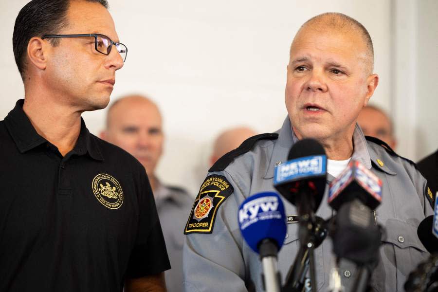 Pennsylvania State Police Lt. Col. George Bivens speaks to the media along with Pennsylvania Governor Josh Shapiro at a press conference held at the Po-Mar-Lin Fire Company after the capture of escaped convict Danelo Cavalcante in Unionville, Pennsylvania, on 13 September, 2023. US police announced the capture of a convicted Brazilian murderer who caught national attention with his daring prison escape and two weeks on the run. (Photo by RYAN COLLERD / AFP) (Photo by RYAN COLLERD/AFP via Getty Images)