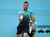 Tennis - ATP 500 - Fever-Tree Championships - The Queen's Club, London, Britain - June 19, 2018 Bosnia's Damir Dzumhur celebrates during his first round match against Bulgaria's Grigor Dimitrov Action Images via Reuters/Tony O'Brien