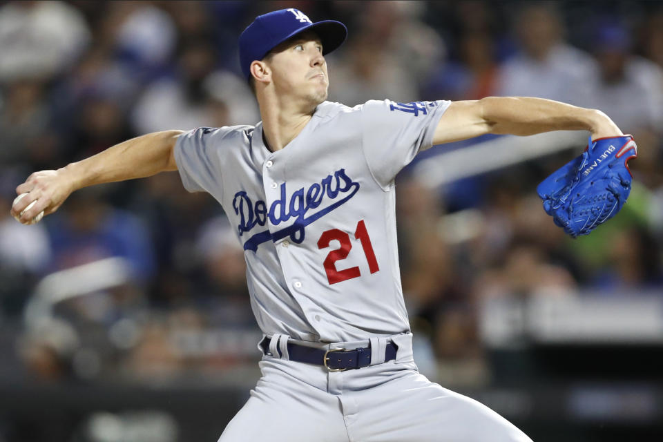 Los Angeles Dodgers starting pitcher Walker Buehler winds up during the first inning of a baseball game against the New York Mets, Sunday, Sept. 15, 2019, in New York. (AP Photo/Kathy Willens)