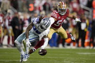 San Francisco 49ers linebacker Fred Warner (54) breaks up a pass intended for Dallas Cowboys wide receiver CeeDee Lamb during the second half of an NFL divisional playoff football game in Santa Clara, Calif., Sunday, Jan. 22, 2023. (AP Photo/Godofredo A. Vásquez)