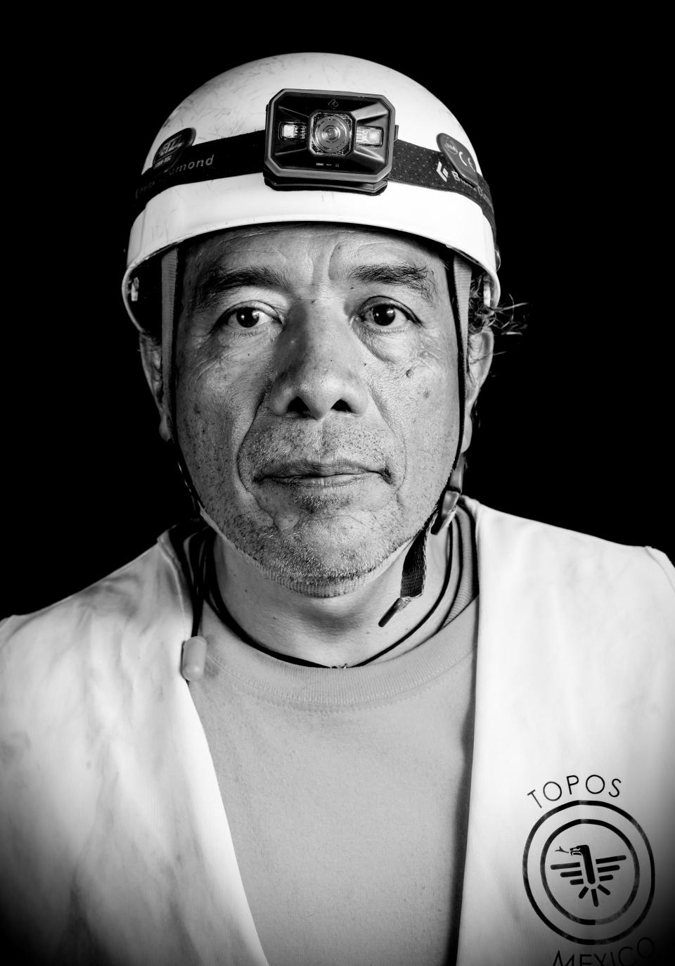 <p>Ruben Benitez, a 57-year-old coach, businessman, administrator and scuba diving instructor who volunteered as a “topo” (mole) — as the diggers who burrow their way into collapsed buildings are known — after the 7.1 earthquake that hit Mexico on Sept. 19, poses for pictures in Mexico City on Sept. 25, 2017. (Photo: Omar Torres/AFP/Getty Images) </p>