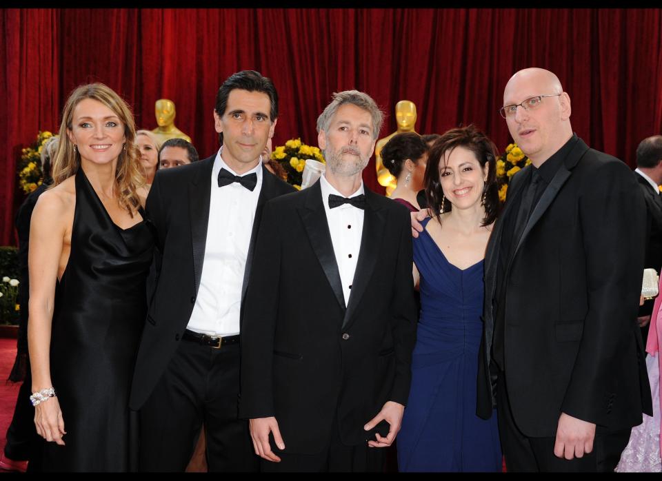 HOLLYWOOD - MARCH 07:  Screenwriter Alessandro Camon (L), producer Adam Yauch (C), writer-director Oren Moverman (R) and guests arrive at the 82nd Annual Academy Awards held at Kodak Theatre on March 7, 2010 in Hollywood, California.  (Photo by Frazer Harrison/Getty Images)