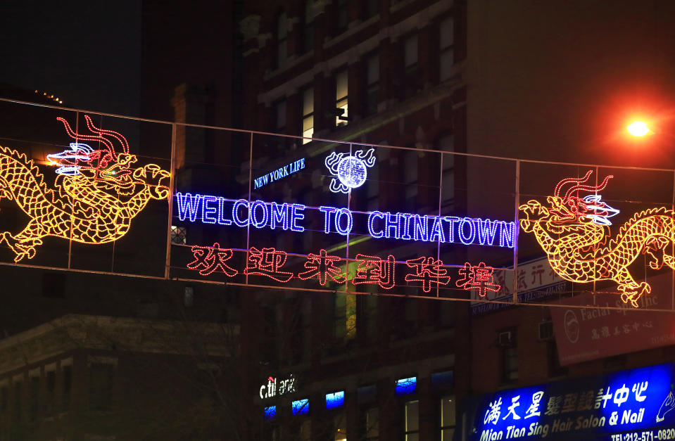 Welcome to Chinatown sign (Bruce Yuanyue Bi / Getty Images)