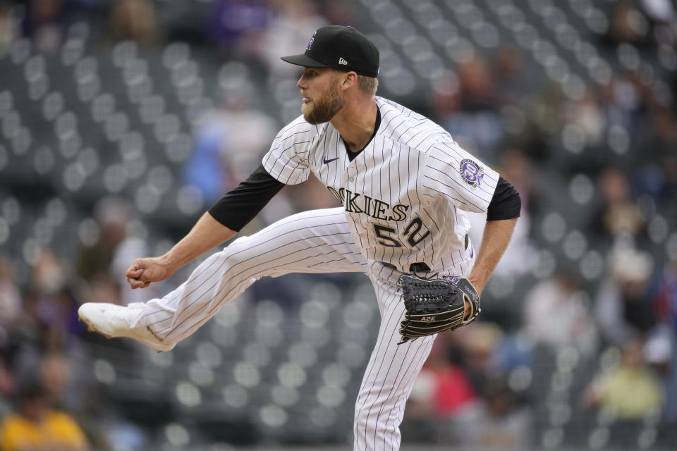 Colorado Rockies relief pitcher Daniel Bard works against the Pittsburgh Pirates in the eighth inning of a baseball game Wednesday, April 19, 2023, in Denver. (AP Photo/David Zalubowski)