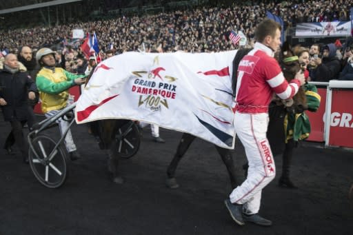 Bjorn Goop and Face Time Bourbon in front of the Vincennes Hippodrome crowds in Paris