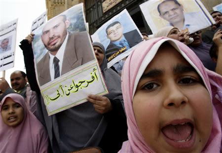 The daughter of a member of the Muslim Brotherhood shouts anti-government slogans during a demonstration in Cairo in this May 25, 2010 file photo. REUTERS/Amr Abdallah Dalsh/Files