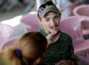 <p>Jesse Skeens, 24, of Clintwood, Virginia, has his mouth checked after he had all of the teeth from his upper jaw removed at the Remote Area Medical Clinic in Wise, Va., July 21, 2017. (Photo: Joshua Roberts/Reuters) </p>