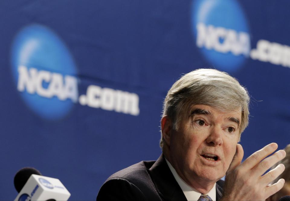 NCAA President Mark Emmert answers a question at a news conference Sunday, April 6, 2014, in Arlington, Texas. (AP Photo/Eric Gay)