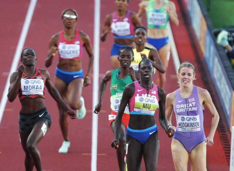 USA's Athing Mu, center, and Great Britain's Keely Hodgkinson, right, battle for the gold in the women's 800 meters on the final day of the World Athletics Championships at Hayward Field in Eugene on Sunday.
