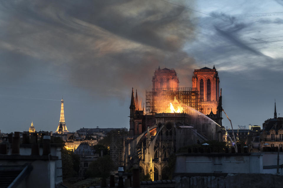 Flames and smoke are seen billowing from the roof at Notre Dame Cathedral on April 15, 2019 in Paris, France. / Credit: Veronique de Viguerie / Getty Images