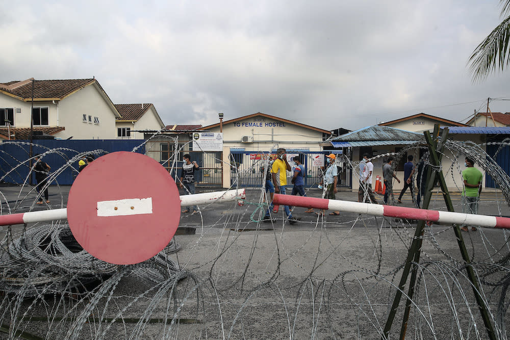 A general view in front of Top Glove Corporation Berhad's female staff dormitories during the enhanced movement control order (EMCO) in Klang November 17, 2020. — Picture by Yusof Mat Isa