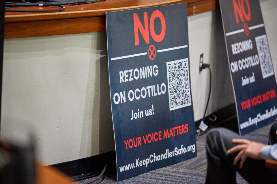 A sign opposing the rezoning of a plot of land on Ocotillo Road is shown during a town hall at Hamilton High School in Chandler on Jan. 25, 2023.