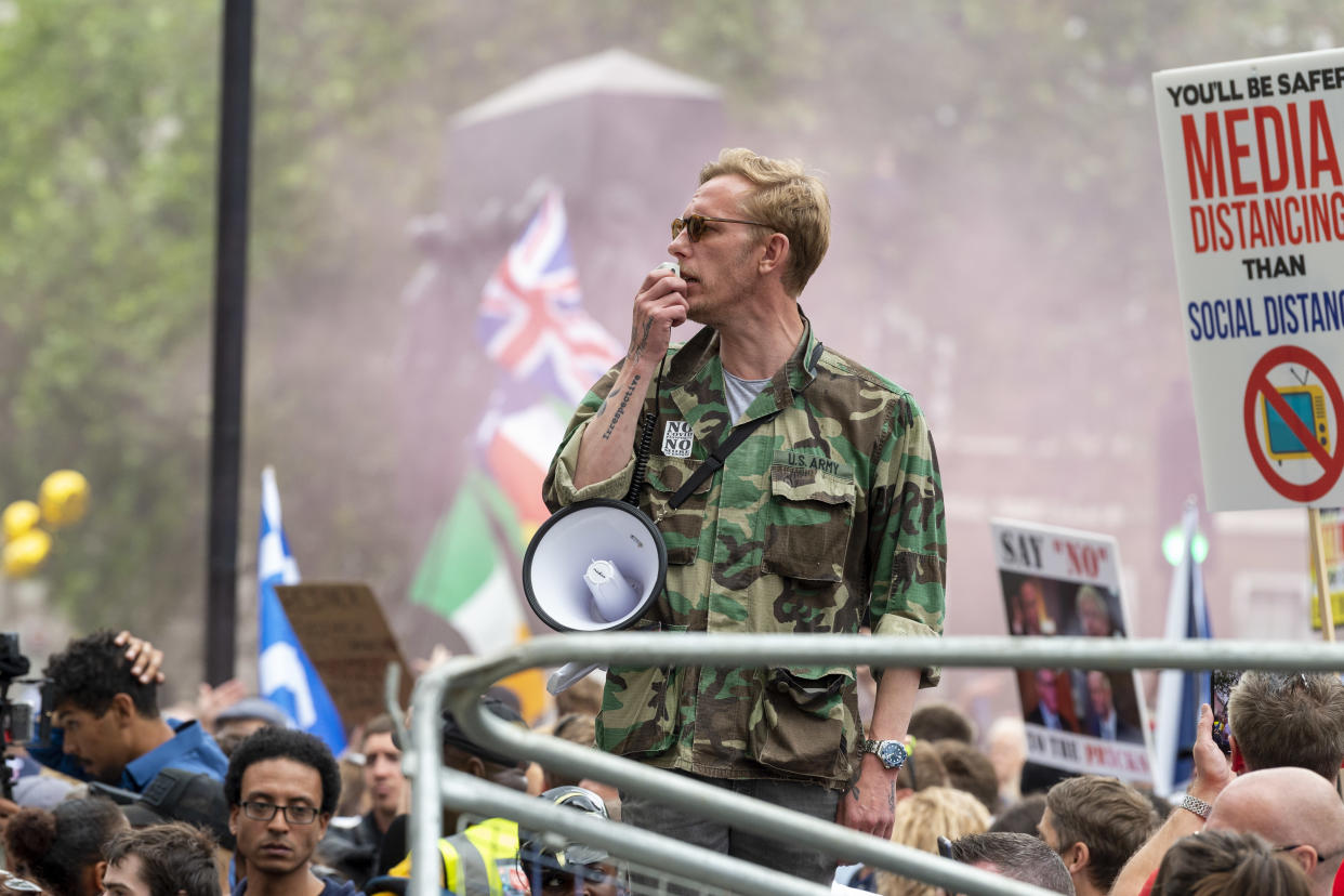  Laurence Fox seen on security barriers addressing the crowd outside Downing Street during the anti-lockdown march Unite for Freedom while shouting on a mega-phone against Boris Johnson & the Government. (Photo by Dave Rushen/SOPA Images/LightRocket via Getty Images)