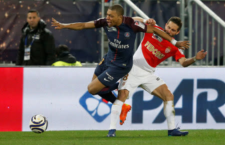 Soccer Football - Coupe de la Ligue Final - Paris St Germain vs AS Monaco - Matmut Atlantique Stadium, Bordeaux, France - March 31, 2018 Paris Saint-Germain's Kylian Mbappe in action with Monaco's Joao Moutinho REUTERS/Regis Duvignau