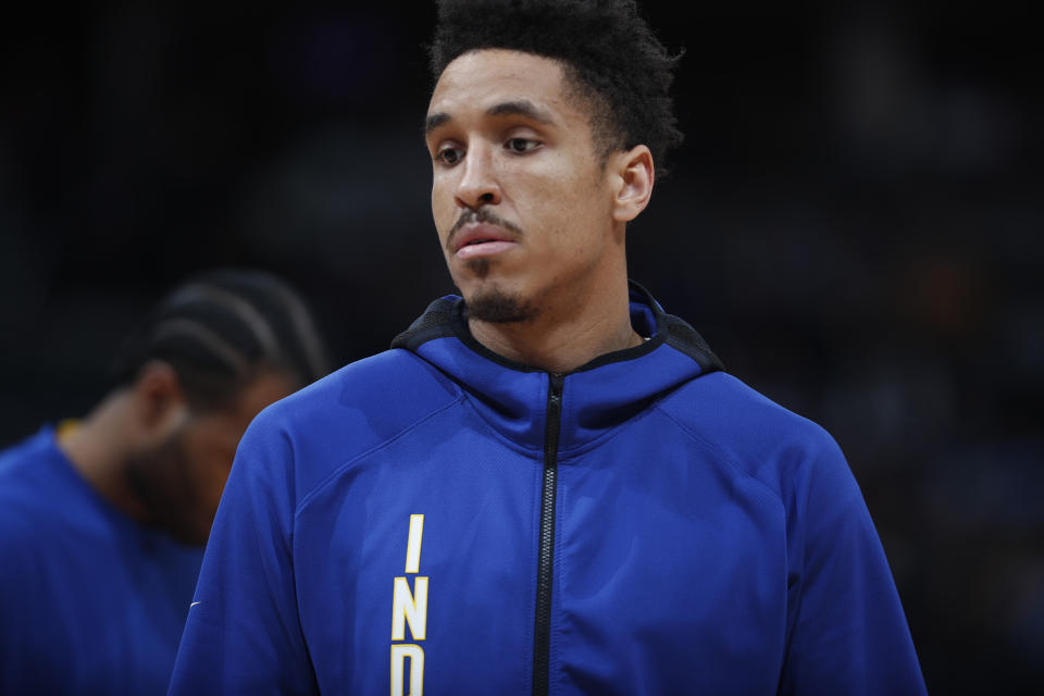 Indiana Pacers guard Malcolm Brogdon (7) in the first half of an NBA basketball game Sunday, Jan. 19, 2020, in Denver. (AP Photo/David Zalubowski)