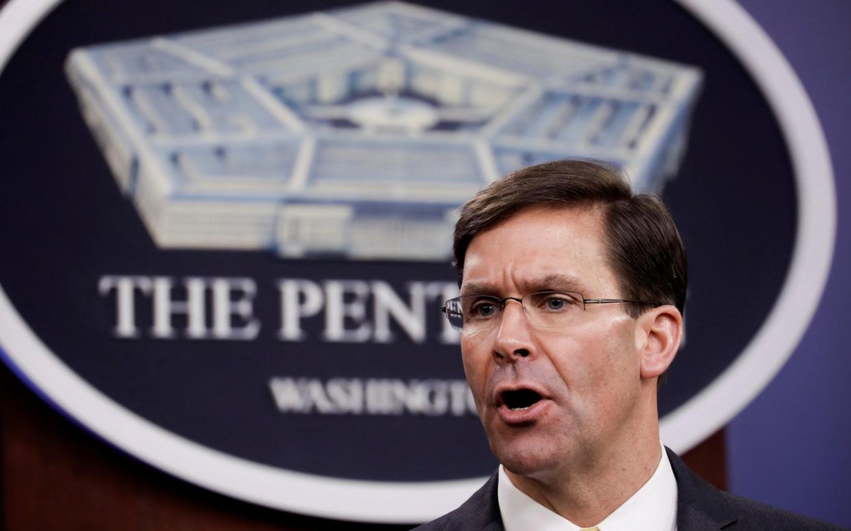 Both former Trump appointees to the post, including Mark Esper (pictured) signed the essay - Yuri Gripas/Reuters