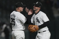 Chicago White Sox's Andrew Vaughn (25) celebrates with Paul DeJong after the White Sox defeated the Atlanta Braves in a baseball game in Chicago, Tuesday, April 2, 2024. (AP Photo/Nam Y. Huh)