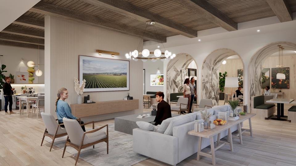 This rendering shows a club room in the proposed 10,000-square-foot clubhouse at Generation Englewood, a 306-unit apartment complex envisioned by Kaplan Residential.