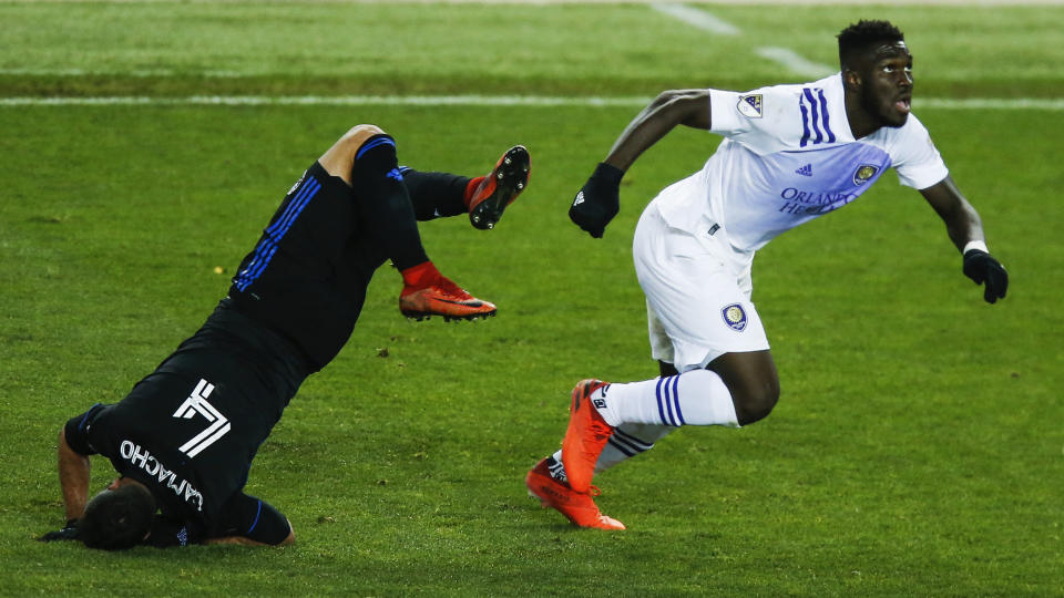 Orlando City attacker Daryl Dike, right, and Montreal Impact defender Rudy Camacho battle for the ball during their MLS match, Sunday, Nov. 1, 2020, at Red BullArena in Harrison, NJ.Â (AP Photo/Eduardo Munoz Alvarez)