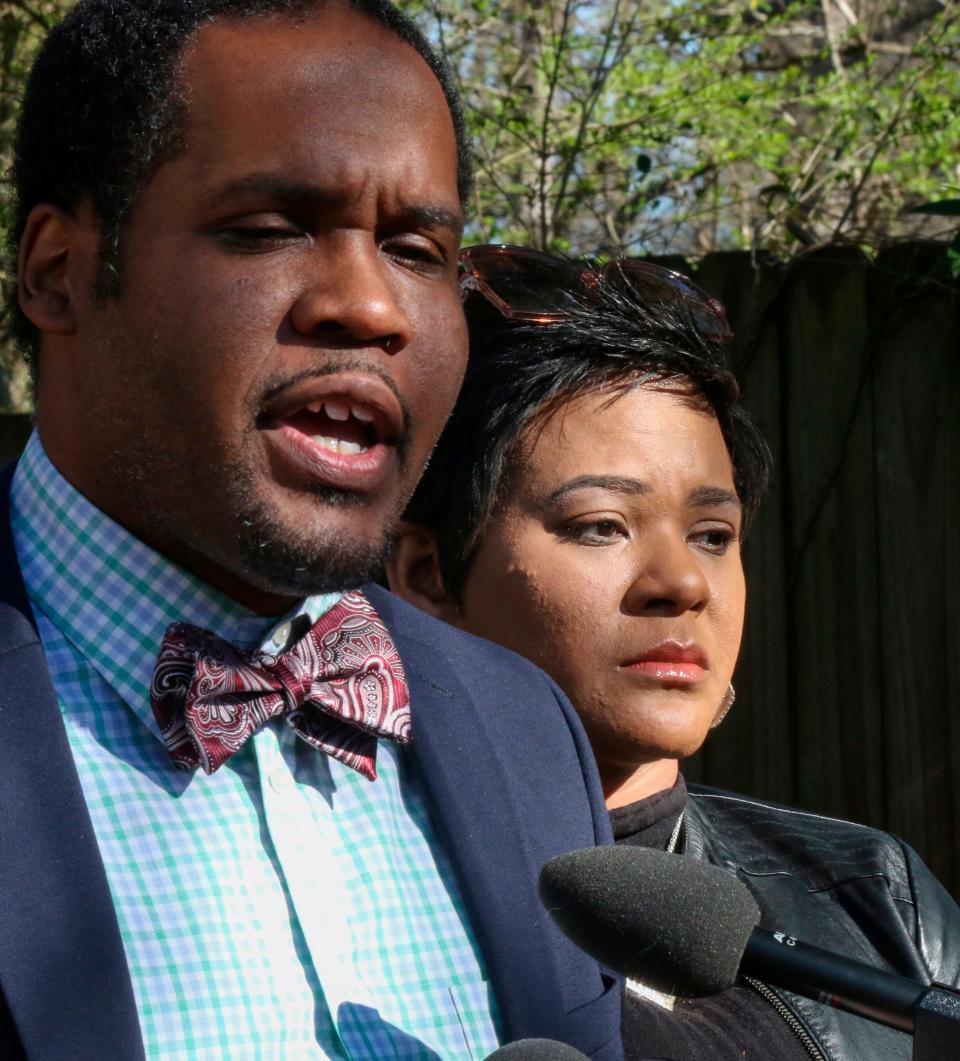 Gerald Griggs, lawyer for the Savage family, with Jonjelyn Savage at a press conference on March 6, 2019, in Decatur, Ga.