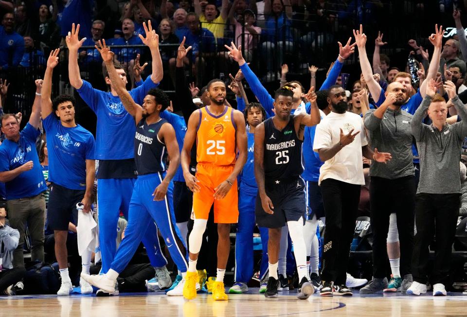 May 8, 2022; Dallas, Texas, USA;  Phoenix Suns forward Mikal Bridges (25) reacts after Dallas Mavericks forward Dorian Finney-Smith hit a three-pointer during game four of the second round for the 2022 NBA playoffs at American Airlines Center.