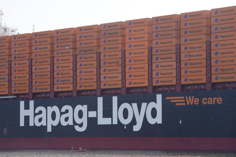 The Hapag-Lloyd containership "Berlin Express" is moored at Burchardkai in the Port of Hamburg. Marcus Brandt/dpa