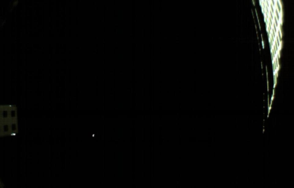 A clear view of Mars (lower left) as seen by NASA's small MarCO-B cubesat on Nov. 24, 2018. At the time, the spacecraft was about 310,000 miles from Mars. <cite>NASA/JPL-Caltech</cite>