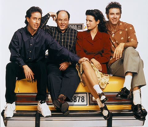 Richards (Far R), with the cast of Seinfeld (L-R): Jerry Seinfeld, Jason Alexander and Julia Louis-Dreyfus. Credit: Getty Images