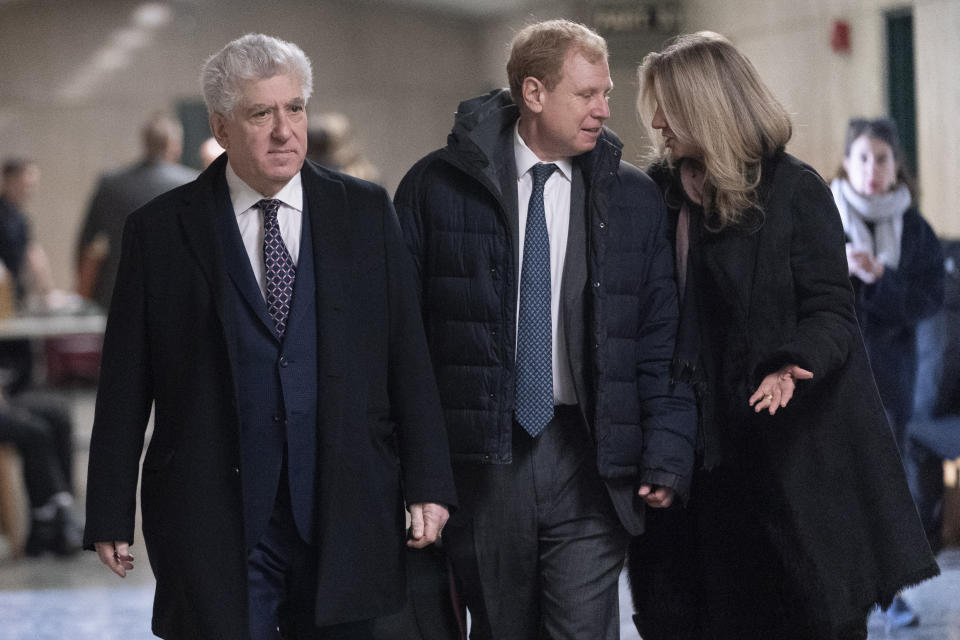 Defendant rare-book dealer Glenn Horowitz, left, arrives at supreme court, Thursday, Feb. 22, 2024, in New York. A judge in New York will continue hearing testimony today in a criminal case involving ownership of the handwritten lyrics for the songs on the "Hotel California" album by The Eagles. (AP Photo/Mary Altaffer)