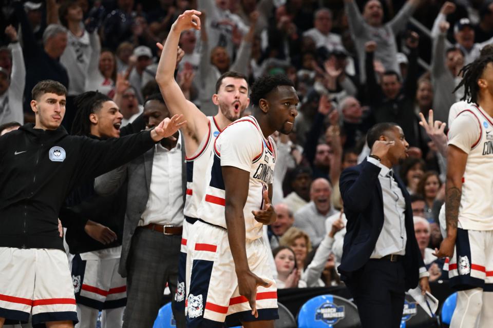 Connecticut guard Hassan Diarra (10) reacts during his team's game against San Diego State in the semifinals of the East Regional of the 2024 NCAA men's tournament at TD Garden.