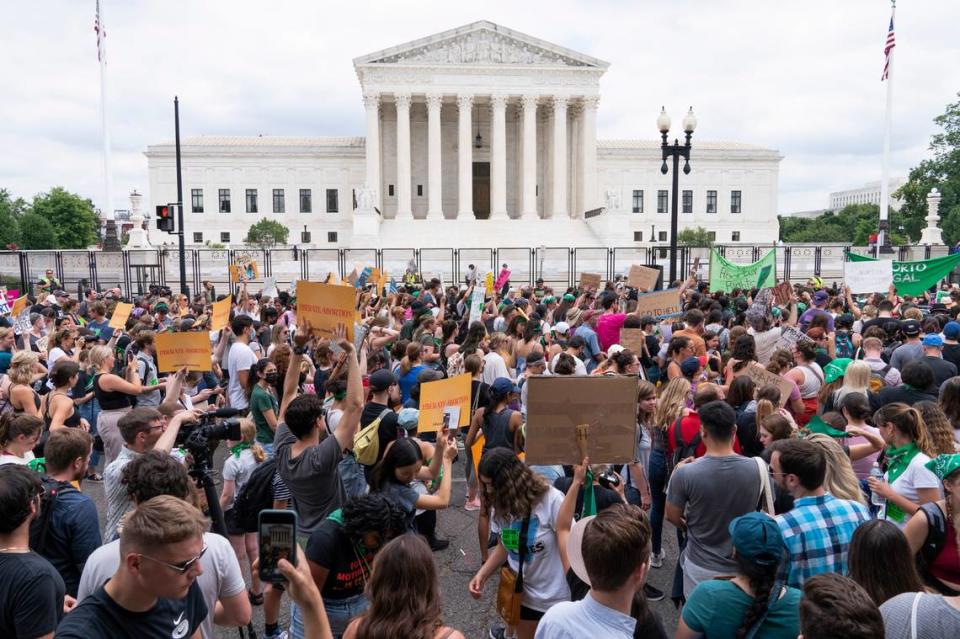 Protesters gather outside the Supreme Court in Washington, Friday, June 24, 2022. The Supreme Court has ended constitutional protections for abortion that had been in place nearly 50 years, a decision by its conservative majority to overturn the court’s landmark abortion cases. (AP Photo/Jacquelyn Martin)