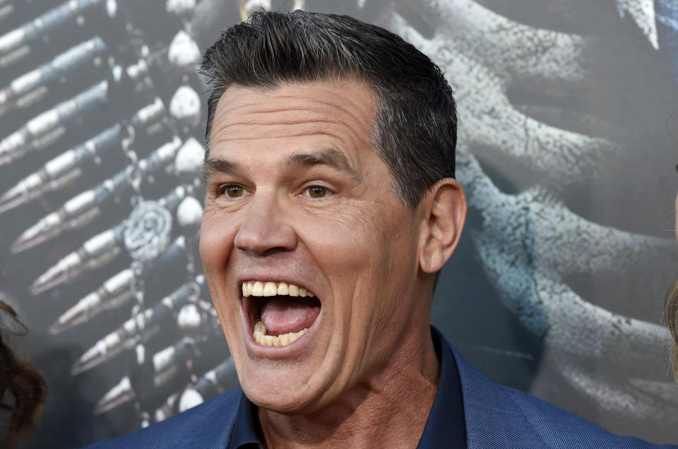 Josh Brolin, a cast member in "Sicario: Day of the Soldado," mugs for photographers at the premiere of the film at the Westwood Regency Theatre, Tuesday, June 26, 2018, in Los Angeles. (Photo by Chris Pizzello/Invision/AP)