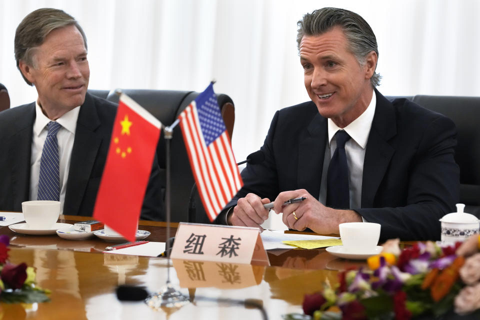 California Gov. Gavin Newsom, right, meets with Zheng Shanjie, head of China's National Development and Reform Commission, unseen, in Beijing, Wednesday, Oct. 25, 2023. Newsom also met with China's senior most diplomat Wang Yi on Wednesday and displayed a brief moment of friendliness that stands in sharp contrast to the dialogue between the U.S. and China in recent years. (AP Photo/Ng Han Guan)