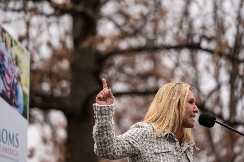 WASHINGTON, DC - JANUARY 05: Representative Marjorie Taylor Greene (R-GA) speaks at a Mom's for America Rally on the Capitol Hill grounds on Tuesday, Jan. 5, 2021 in Washington, DC. (Kent Nishimura / Los Angeles Times)